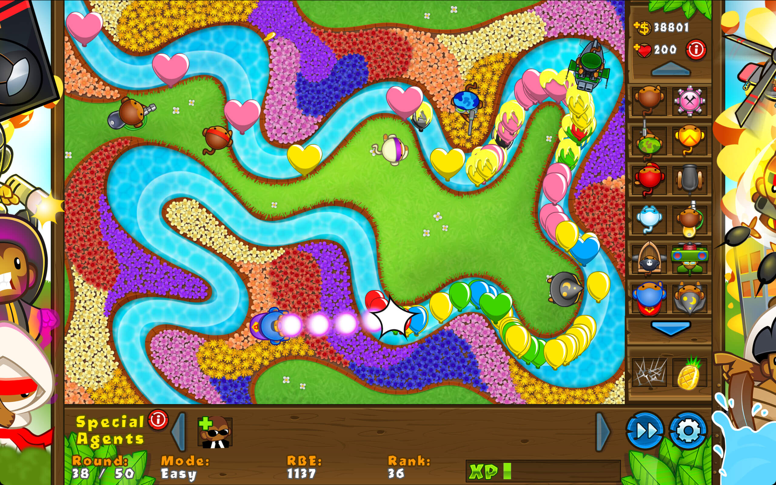 Bloons TD 5: classic Bloons map with towers and balloon waves